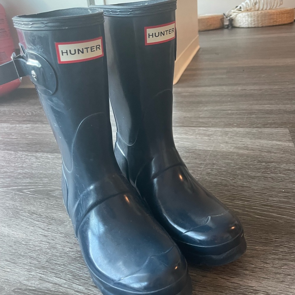 Glossy navy hunter boots mid length